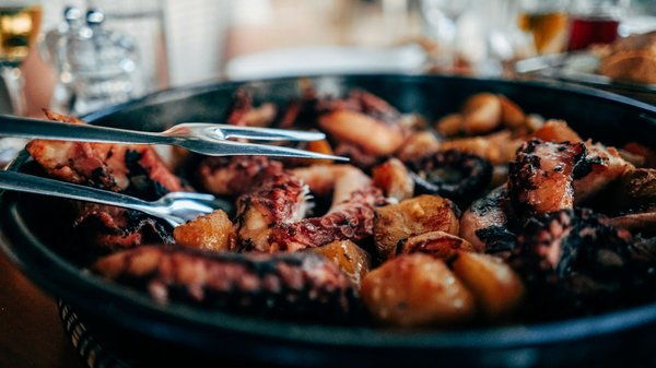 What's the Technique for Perfectly Grilled Octopus with a Mediterranean Marinade?